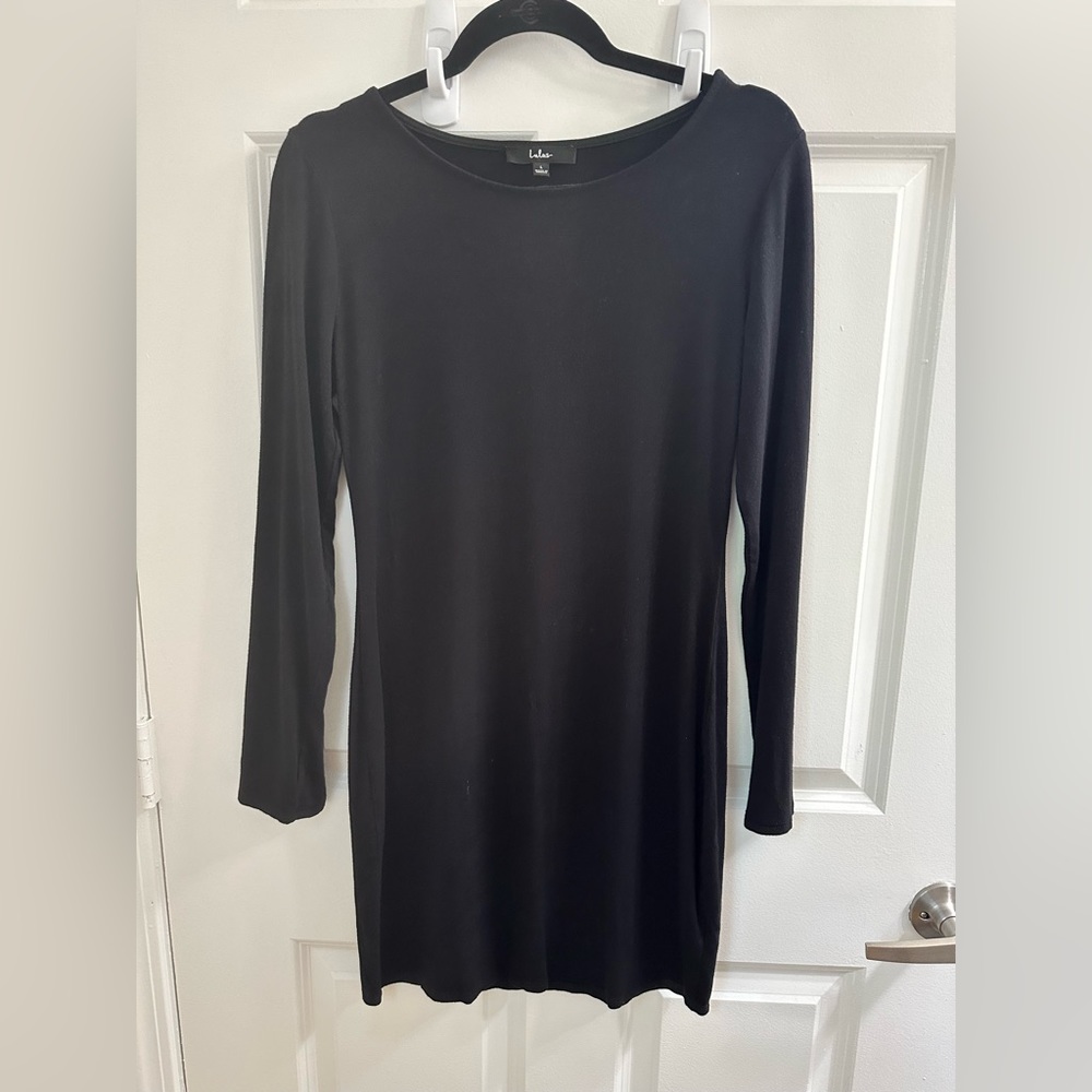 Black long sleeve fitted dress. Size Large.
